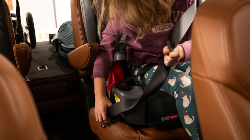 the armrest and cup holder on the britax make the seat wider and...