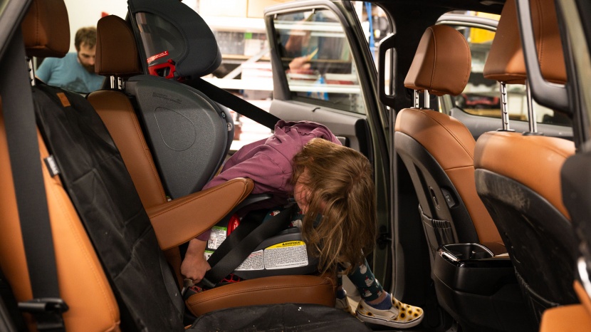 younger or shorter passengers might struggle to reach the buckle by...