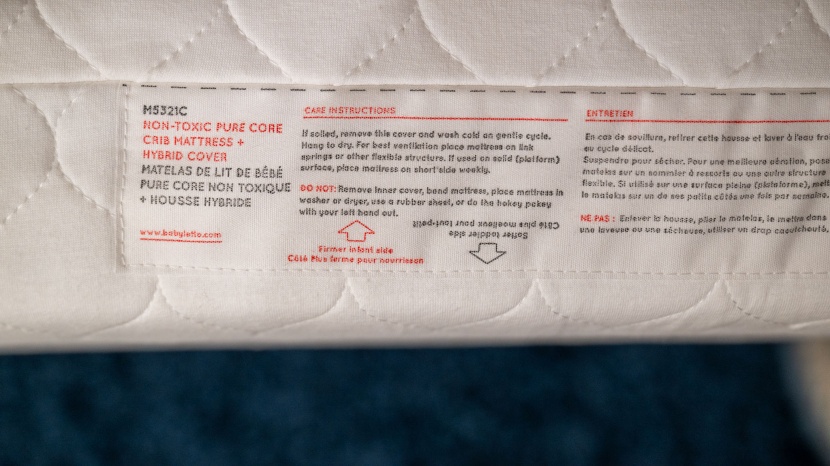 crib mattress - the babyletto includes useful information on which side goes up when.