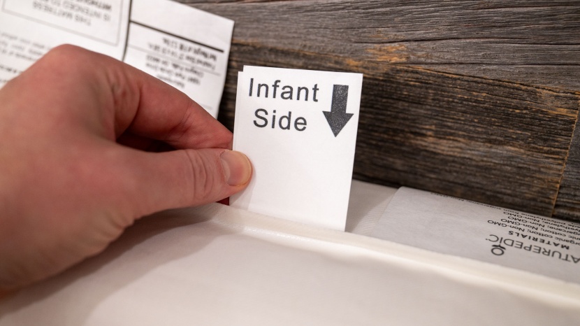 crib mattress - if your mattress has dual sides, you want to ensure you are using...