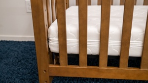 The Newton fits in our smallest crib without a gap, but it isn't so...