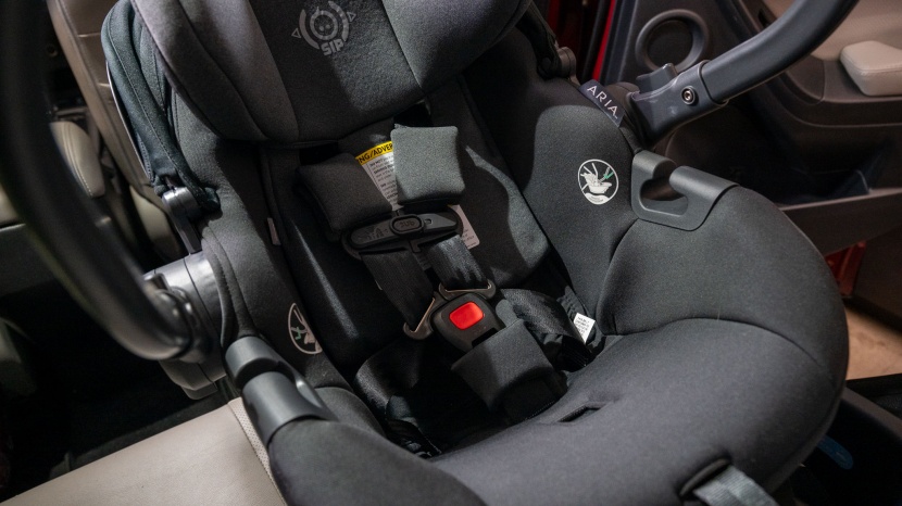 uppababy aria - the harness loosen button on the aria is placed deeper into the...