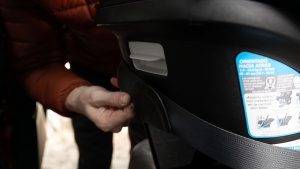 There is a belt retention clip on the back of the Shyft to hold the...