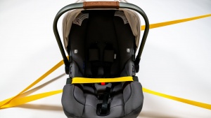 The lap portion of your vehicle seatbelt goes across the main part...