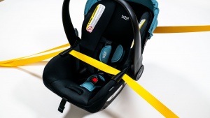 The belt path on the Britax carrier pulls the lap portion fo the...