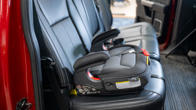 the shuttle plus can be used without the back, making it lighter...