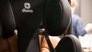 The Cambria shoulder strap positioner is close to the passenger's...