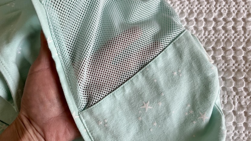 swaddle and sleep sack - the sleepea has mesh at the hips and shoulders to regulate...