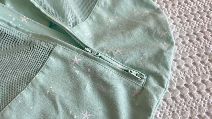 swaddle and sleep sack - two-way zippers make diaper changes easy.