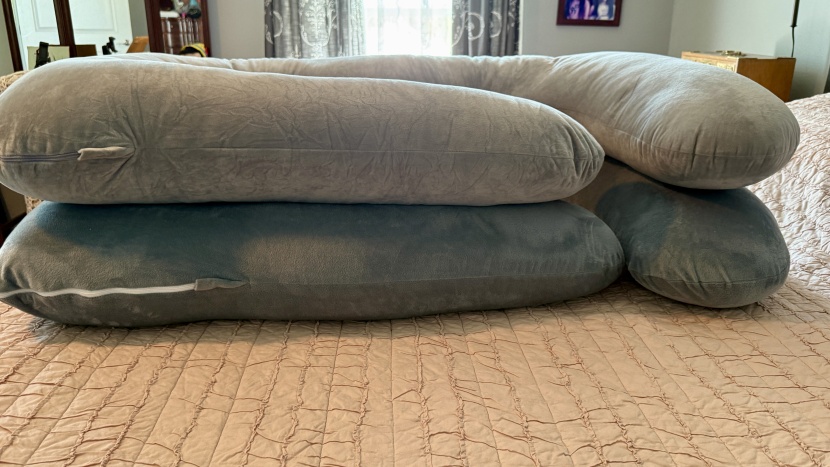 pregnancy pillow - the chilling home (bottom) and the momcozy&#039;s (top) velvet covers...