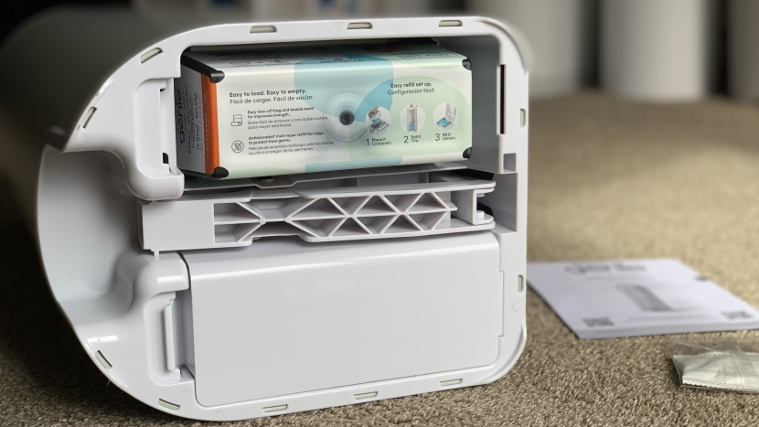 diaper pail - the platinum refill bags claim to lock odors. to load a new refill...