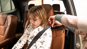 The shoulder guide positioner might require a little parent help as...