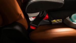 The TurboBooster lap belt pathway is color-coded, and our tester had...