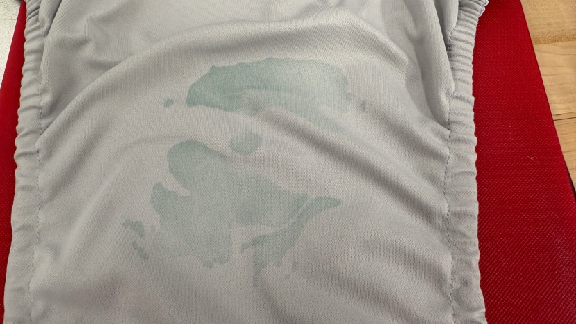 when absorbency fails, moisture escapes to the outer cover, as seen...