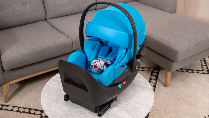 cybex cloud g lux - the cloud&#039;s shell is somewhat busy with extra parts and a hatch-like...