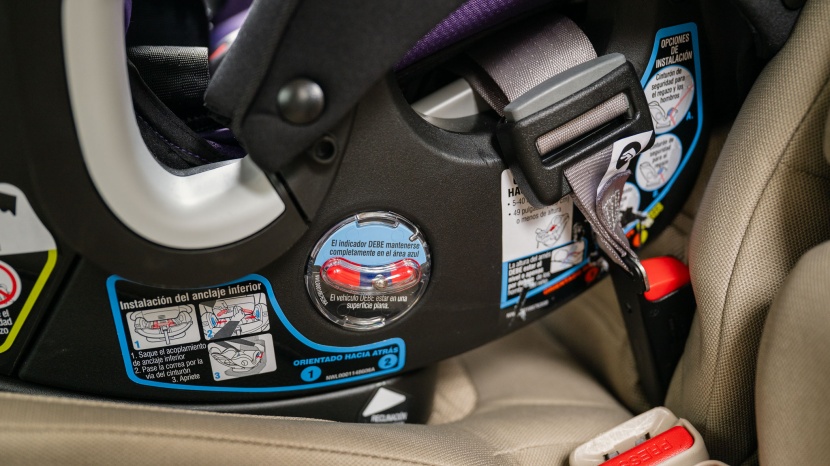 the lx has grey plastic components marking the strap and belt...