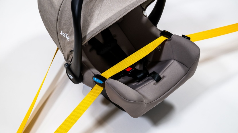 the lap portion of the vehicle belt goes acorss the foot portion of...