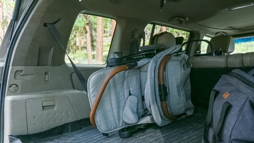 nuna trvl - the nuna trvl fits into the suv&#039;s cargo space with additional room...