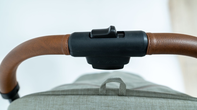 nuna trvl - the nuna&#039;s fold mechanism works with a slide, press, and fold.