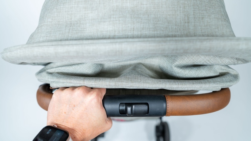 nuna trvl - one downside is that when the sunshade isn&#039;t extended, it can brush...