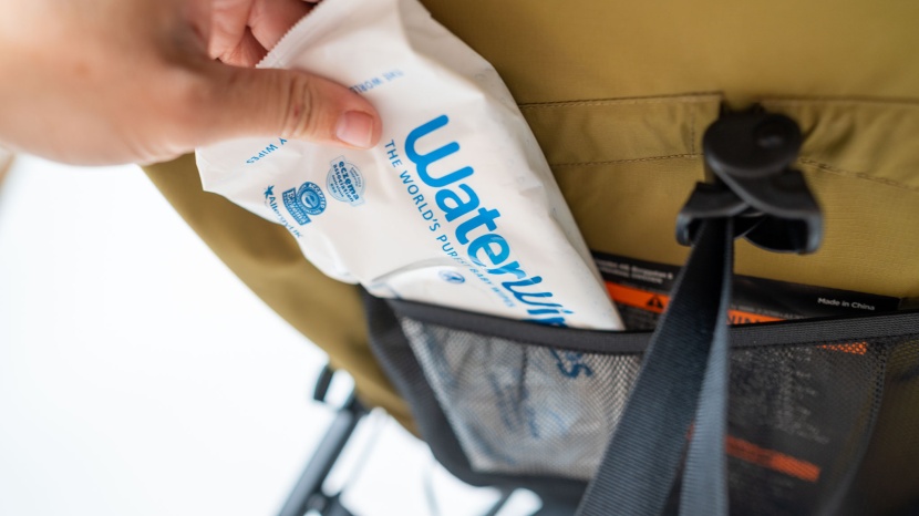 the back of the seat features a mesh pocket for additional storage