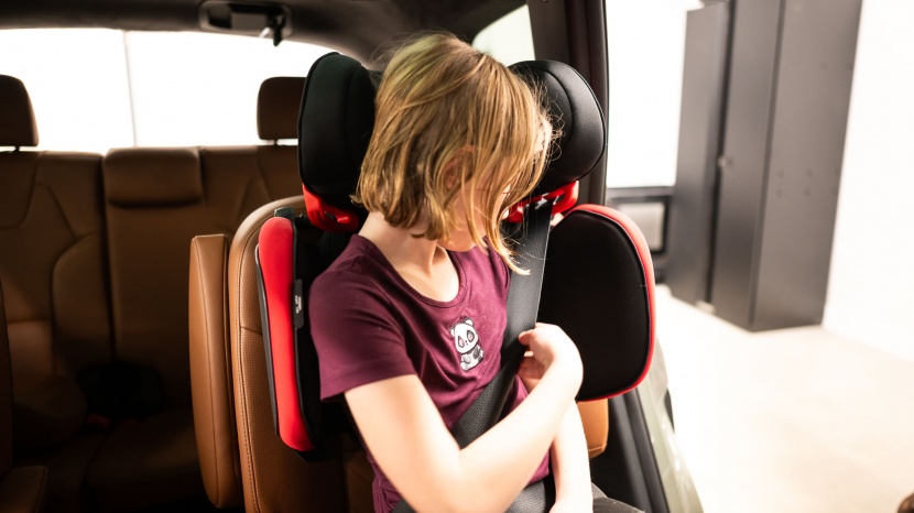 the shoulder positioner on the peg places the belt in a comfortable...