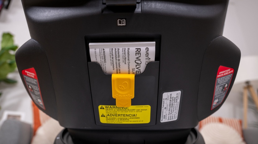 evenflo revolve360 slim  2-in-1 - the rotation lock key and user manual are located on the back of the...