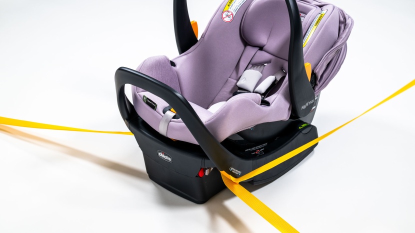 both portions of the vehicle belt thread through the base, with only...