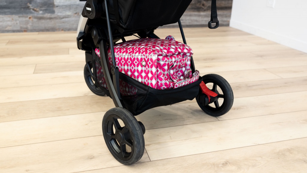 thule spring - while the bin on the spring was large enough for our large diaper...