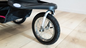 The rubber, air-filled tire on the Expedition helps it move easily...