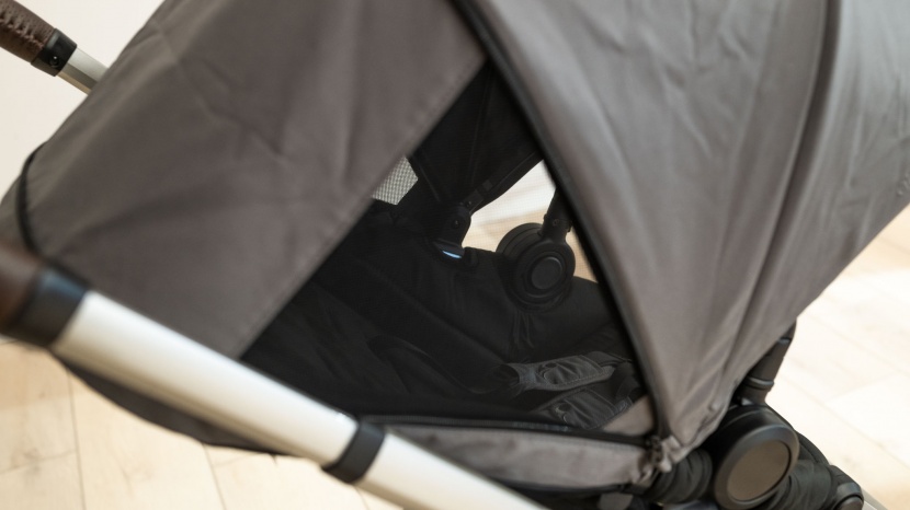 the city sights has mesh windows on the sides of a fully open...