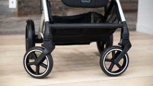 The wheels on the Cybex are smaller and foam-filled plastic, which...